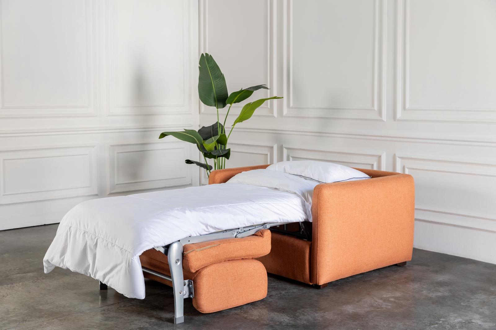 comeover single sofa bed converted into a bed with hospitality grade white bedding