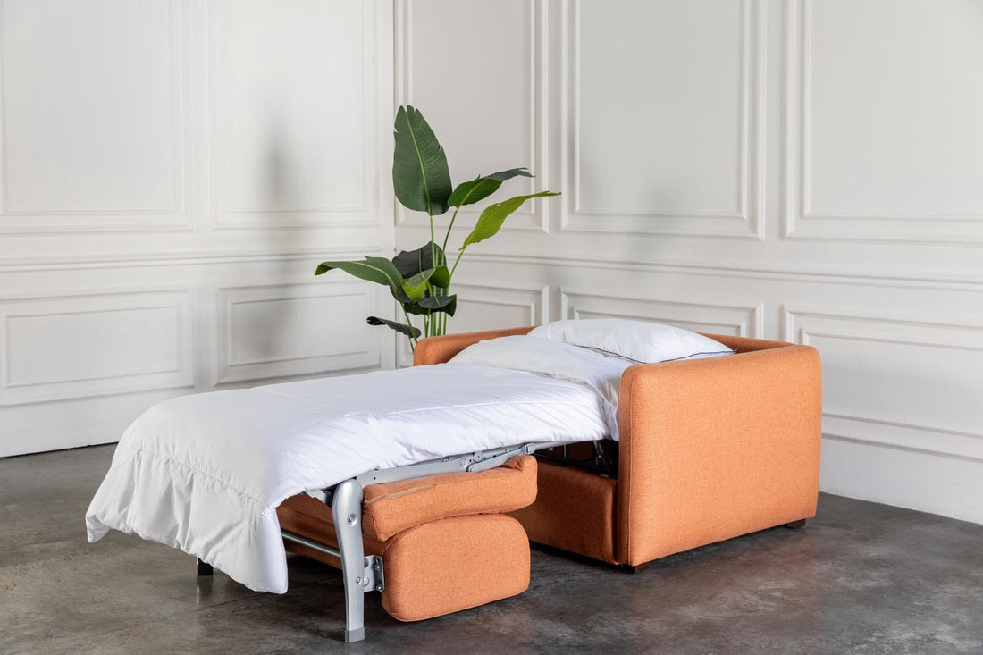 comeover single sofa bed converted into a bed with hospitality grade white bedding 